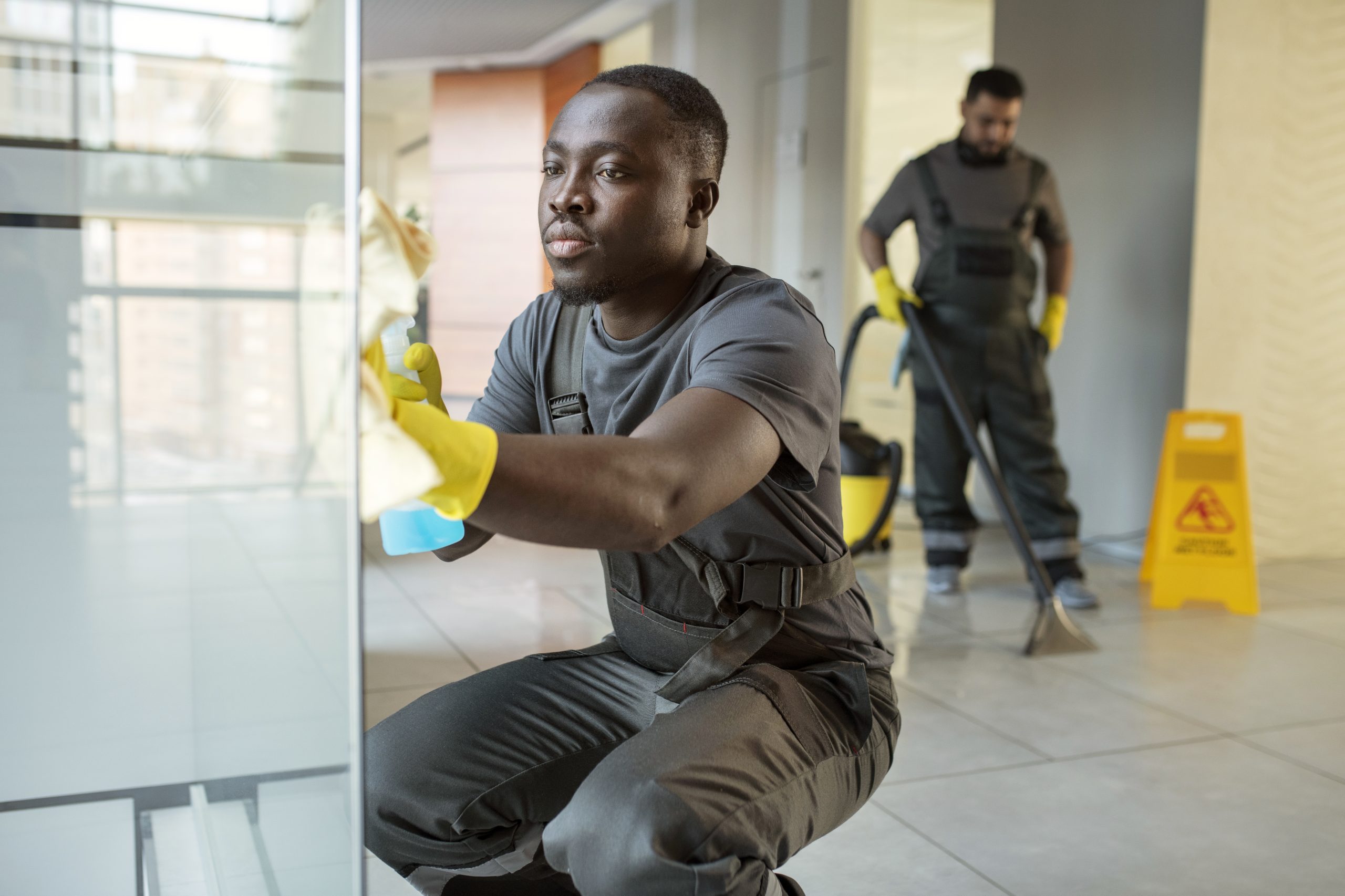 full-shot-men-cleaning-office